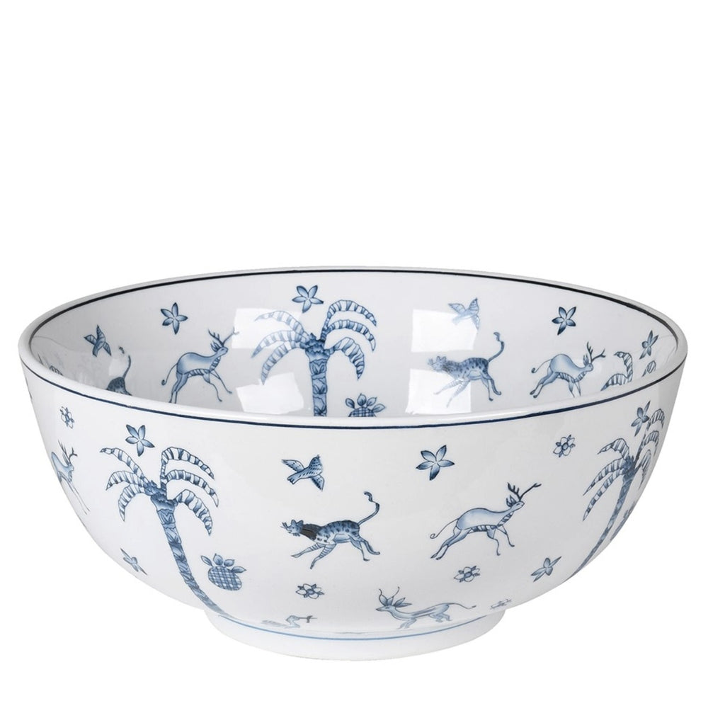 White ceramic bowl with blue animal and floral patterns on a white background
