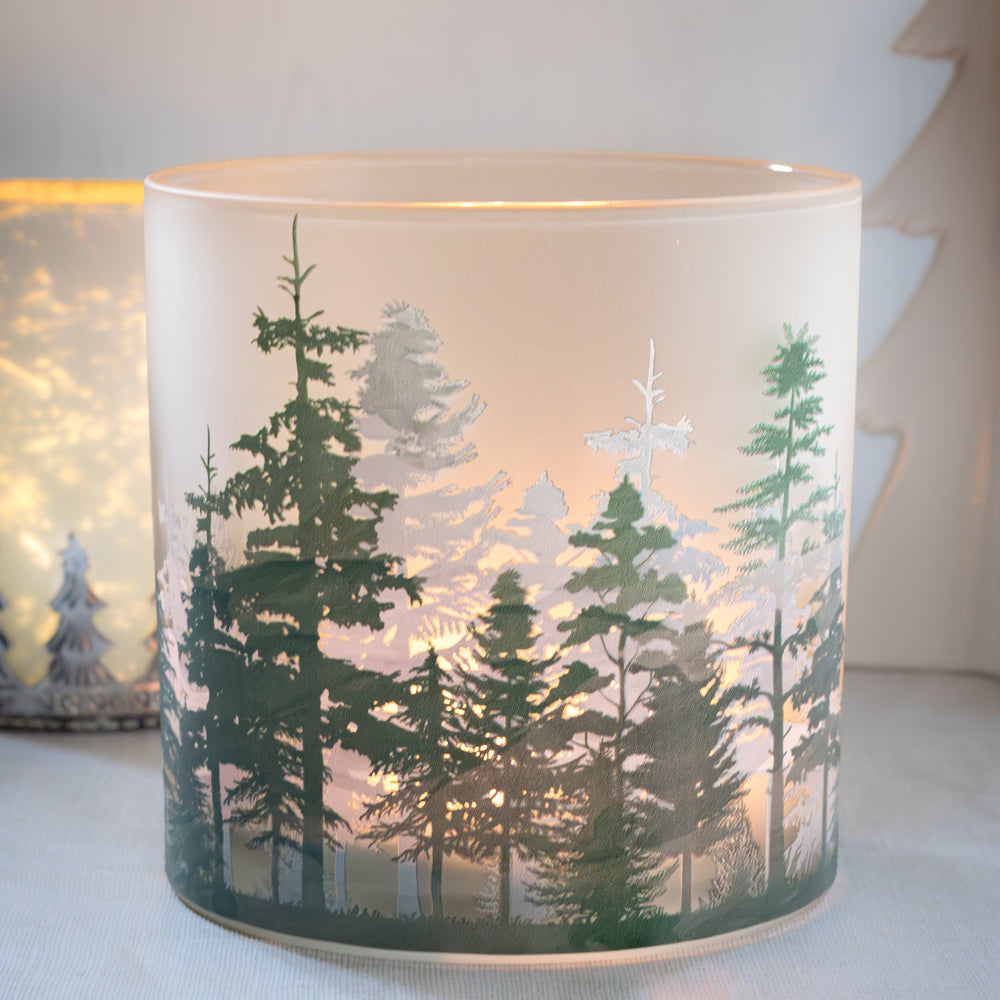 Candle holder with forest design 