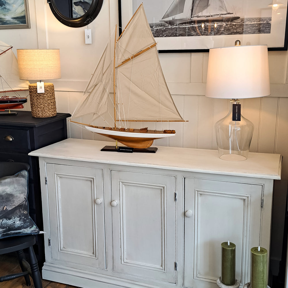 Pine sideboard painted in a soft off-white colour