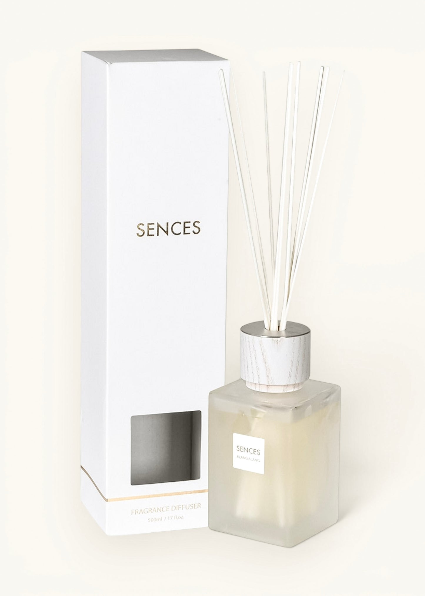 Sences reed diffuser with a frosted glass bottle, silver cap, and diffuser sticks 