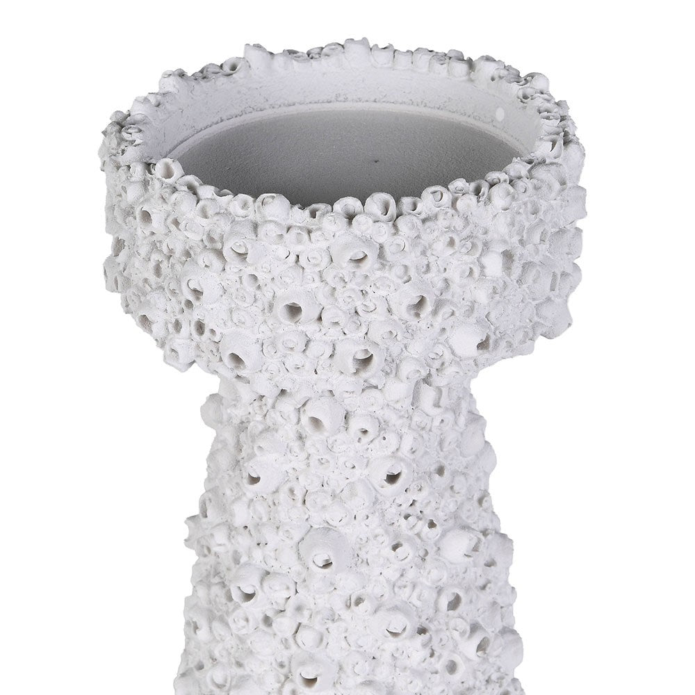 Texture of white barnacle effect candle holder